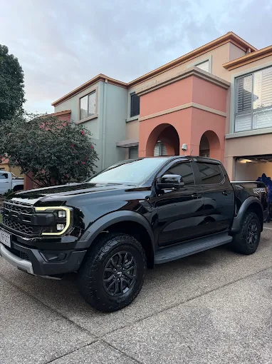 Black Ford Ranger Raptor detailed at a customer's home